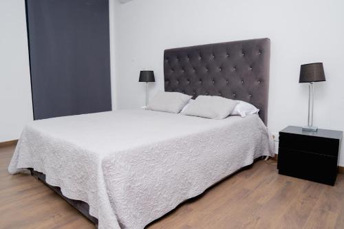 Ένα ή περισσότερα κρεβάτια σε δωμάτιο στο Villa Santiago