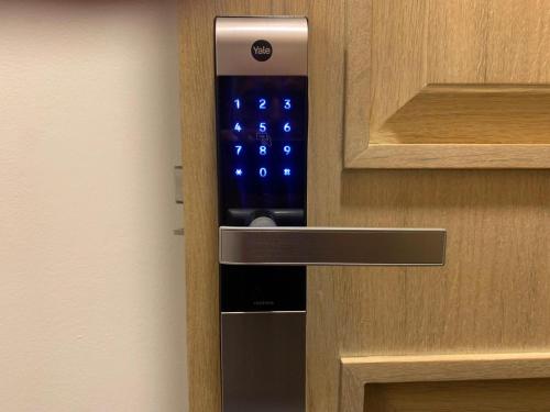 a close up of a door with a key pad at Deluxe Apartment at the seaside in Pasaport Alsancak Izmir in Konak