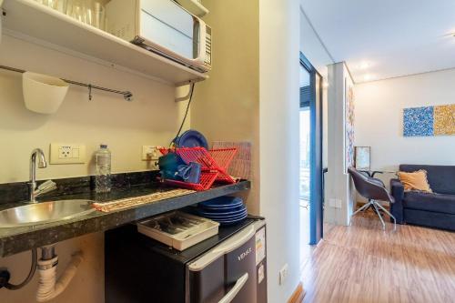 a kitchen with a sink and a counter top at LFlats no Hotel Stella Vega (EX-Mercury Ibirapuera) in Sao Paulo