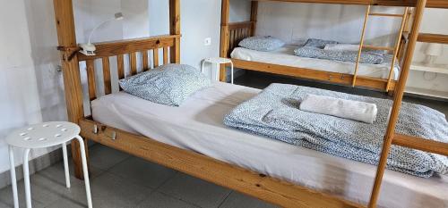 Кровать или кровати в номере Albergue Puntagorda