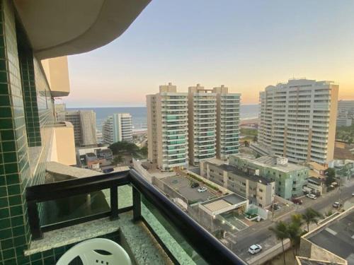 a view of a city from the balcony of a building at Quarto c/Ar, sala, cozinha, banheiro, garagem 24h. in Salvador