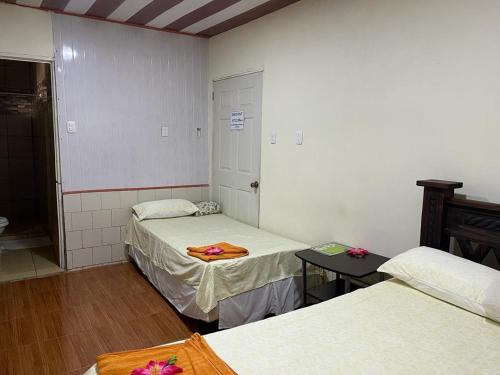 Cama o camas de una habitación en Hotel Margarita Sierpe