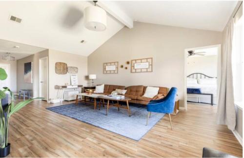 a living room with a couch and a table at 4BR Near Galveston, Kemah NASA, Recently Rehabbed in La Marque