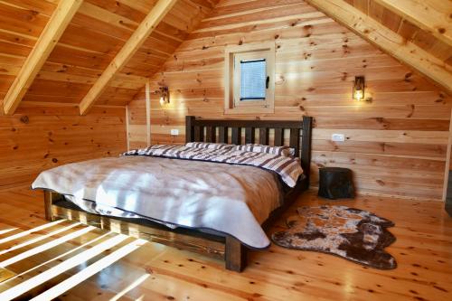 מיטה או מיטות בחדר ב-Cottage Kolašin