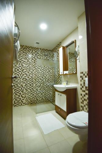 Un baño de Hotel Gold