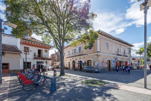 a group of bikes parked on a city street at Sumak Suite in Cuenca