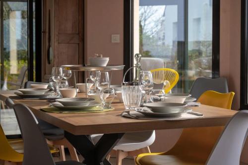 Εστιατόριο ή άλλο μέρος για φαγητό στο Résidence Ker Diskuiz-bugueles - Maisons & Villas pour 8 Personnes 014