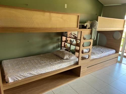 Divstāvu gulta vai divstāvu gultas numurā naktsmītnē Meridional Carneiros
