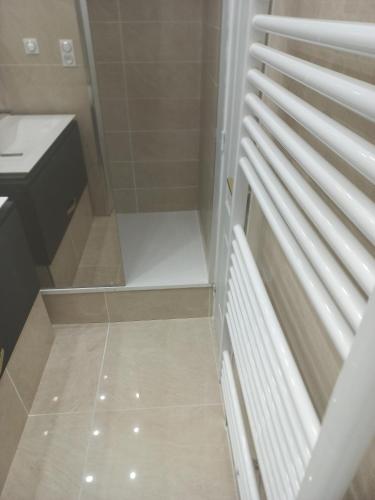 a bathroom with a staircase with a sink and a toilet at Best Experience Tours Centre in Tours