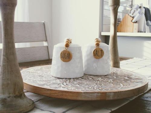 two white towels on a table with price tags on them at BikeslParkPasslPizzaOvenlSnoConelYouTubeTVlEV in Greenville
