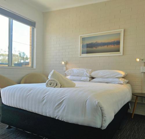 Postel nebo postele na pokoji v ubytování Sea Lake Motel