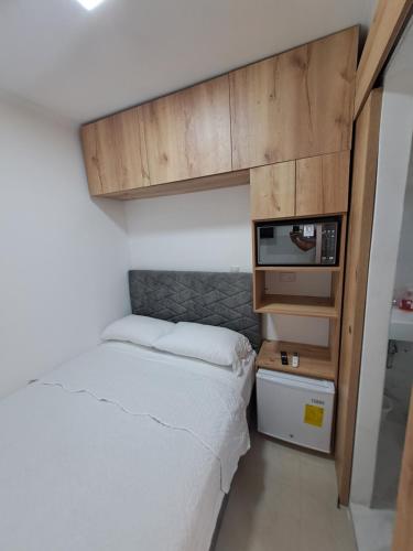 En eller flere senger på et rom på Ultra mini suite privada con baño
