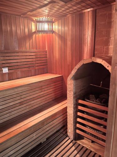 an inside of a sauna with a brick oven at Mission Hills Hotel Resorts Dongguan in Dongguan