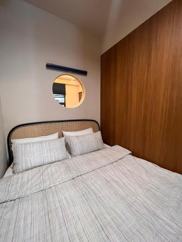 Una cama o camas en una habitación de tt-house
