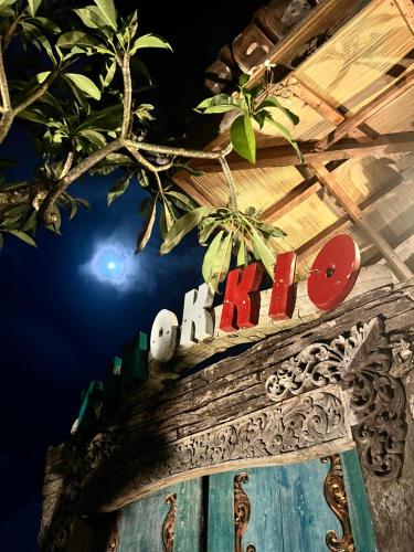 a sign that says hilo on top of a door at PINOKKIO B&B Restaurant in Jimbaran