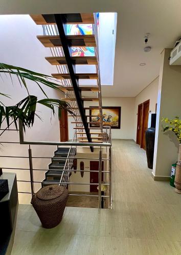 a staircase in a house with a skylight at Charme 64 Hotel Boutique in Cartagena de Indias