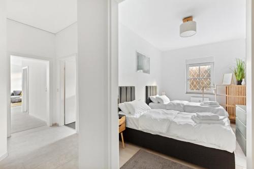 Postel nebo postele na pokoji v ubytování MARLEI 6 Apartment mit 3 Schlafzimmern, gemütlichen Wohnbereich, mit 2 WCs