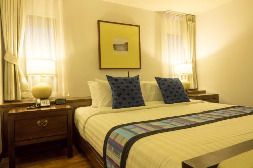 Postel nebo postele na pokoji v ubytování Villa Lantara Chiangmai