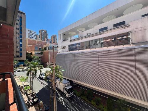 a view of a building with a roller gate at 2 Bedroom 1 Bathroom Cabecera with Doorman in Bucaramanga