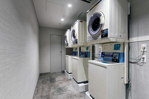 a laboratory with two machines in a room at Hotel JAL City Fukuoka Tenjin in Fukuoka