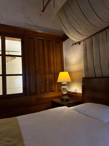 Postel nebo postele na pokoji v ubytování Tas Konak Hotel-City Center