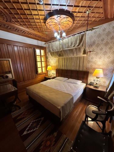 Postel nebo postele na pokoji v ubytování Tas Konak Hotel-City Center