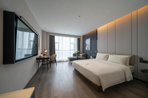 Katil atau katil-katil dalam bilik di Atour Hotel Chengdu Dujiangyan Darong City