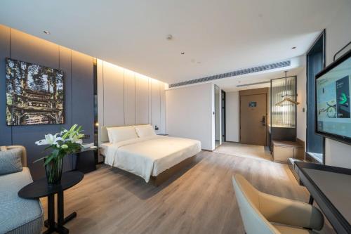 Katil atau katil-katil dalam bilik di Atour Hotel Chengdu Dujiangyan Darong City