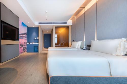 TV/Unterhaltungsangebot in der Unterkunft Atour Hotel Shenzhen Guangming New City