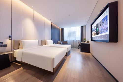 Μια τηλεόραση ή/και κέντρο ψυχαγωγίας στο Atour Hotel Shenzhen Futian CBD Civic Center