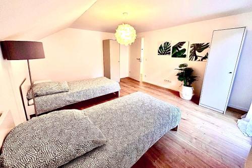 Ένα ή περισσότερα κρεβάτια σε δωμάτιο στο Beautiful House in Salzweg