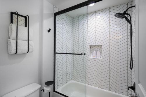 a bathroom with a shower and a toilet and a sink at Scottsdale Vacation Rentals in Scottsdale