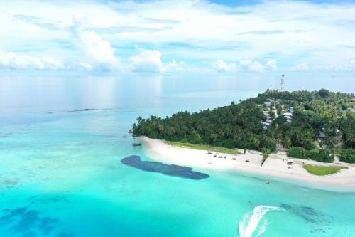 an aerial view of an island in the ocean at Manta Sea View Himandhoo in Himandhoo 