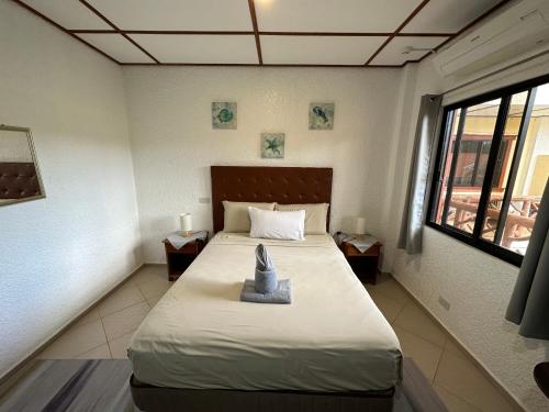 Sunville Hotel and Restaurantにあるベッド