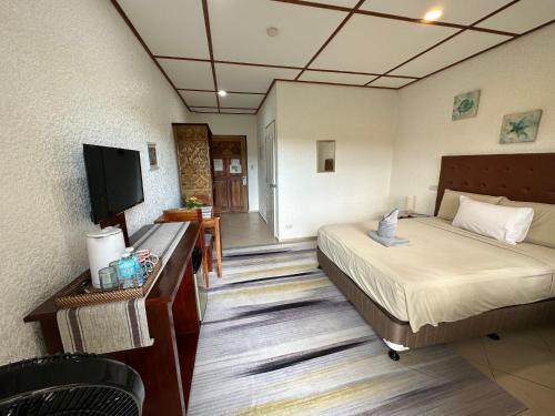 Sunville Hotel and Restaurantにあるテレビまたはエンターテインメントセンター