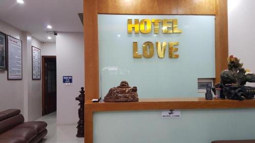 a hotel room with a sign that reads hotel love at Love Hotel Hà Đông HN - by BAY LUXURY in Hà Ðông