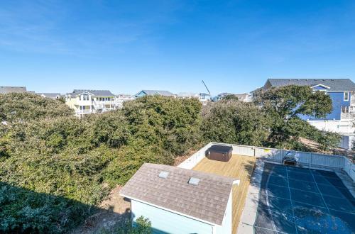an aerial view of a house with a swimming pool at Duck R Way in Duck