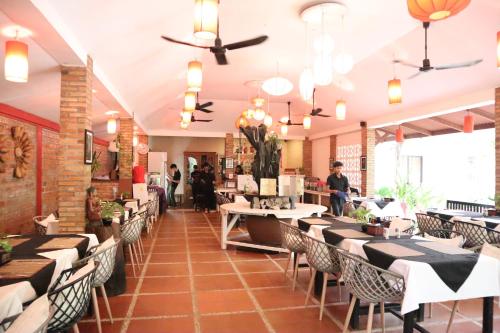Een restaurant of ander eetgelegenheid bij La Niche D'angkor Boutique Hotel
