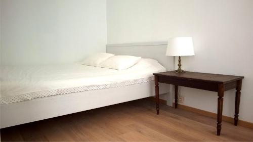 Кровать или кровати в номере Bijna Wit, Nabij Trein, Metro n7688
