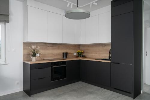 Η κουζίνα ή μικρή κουζίνα στο Green Heaven Modern Suites