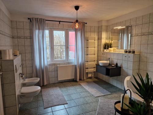 Ένα μπάνιο στο Ferienhaus am Saaler Bodden