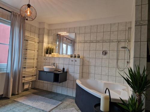 Ένα μπάνιο στο Ferienhaus am Saaler Bodden