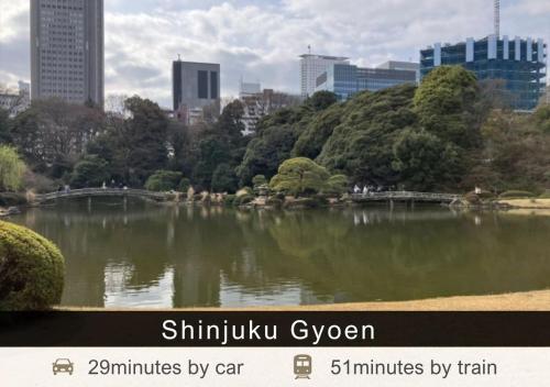 a picture of a pond in a city with buildings at Tokyu Stay Aoyama Premier in Tokyo