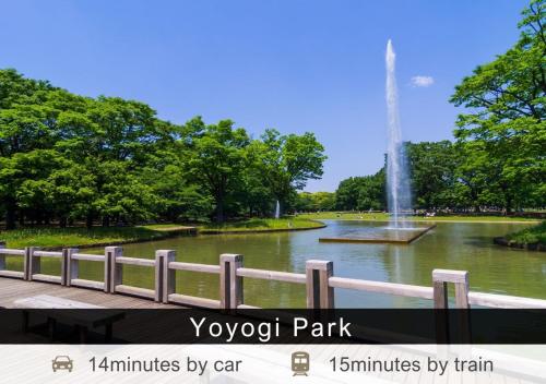 a park with a fountain in the middle of a pond at Tokyu Stay Aoyama Premier in Tokyo