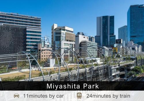 a view of a city skyline with a train at Tokyu Stay Aoyama Premier in Tokyo