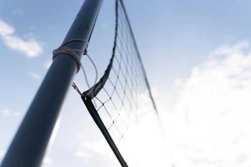 a volleyball net with the sky in the background at MyseA VillasNikiti in Nikiti