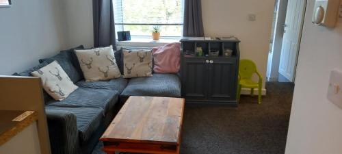 Et opholdsområde på The Old Post Office Apartment