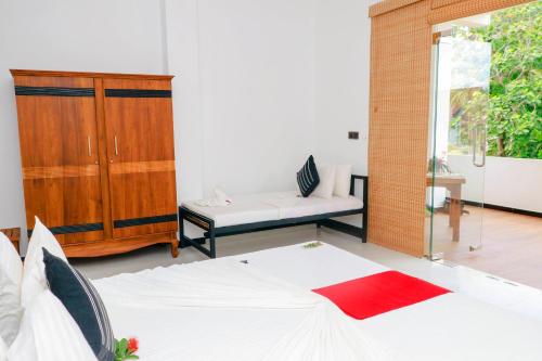 Katil atau katil-katil dalam bilik di DK Zur Einkehr Hotel