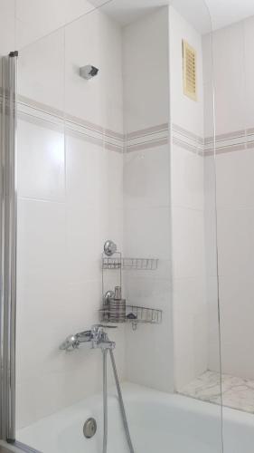 a bathroom with a shower with a glass door at Royal II in Salou