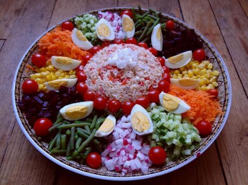 a bowl filled with different types of vegetables on a table at Camp trip Merzouga in Merzouga